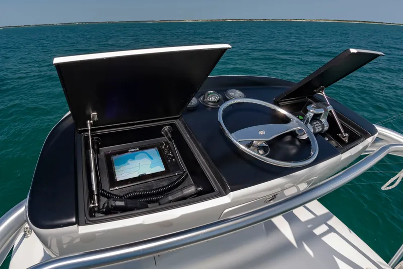 Slide: The Image of The image shows the helm of a 2018 Viking Sport Tower with a modern navigation system. - 22