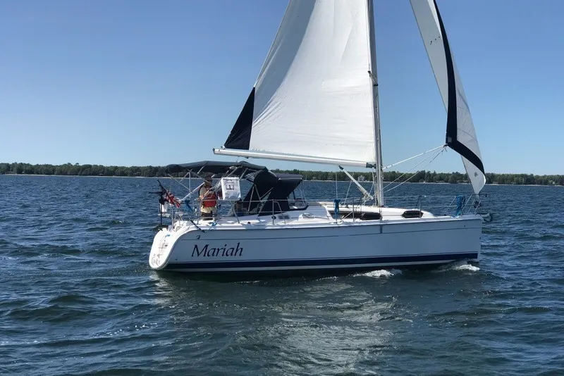 Slide: The Image of Sailing yacht "Mariah" on water, 2006 Hunter 31 model, clear blue sky. - 41