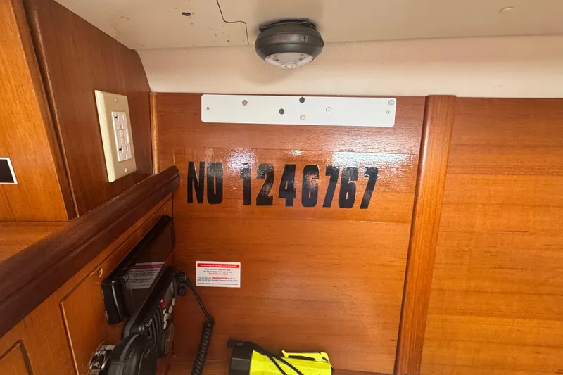 Slide: The Image of Interior of 2006 Hunter 31 sailboat with registration number 1246767 on wooden panel. - 22