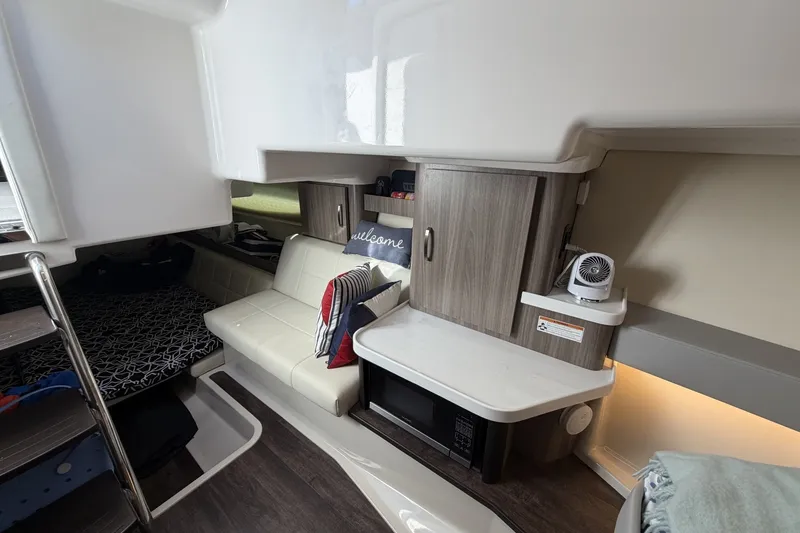Slide: The Image of Interior of 2022 Regal 36 Grande Coupe featuring cozy seating and modern amenities. - 30