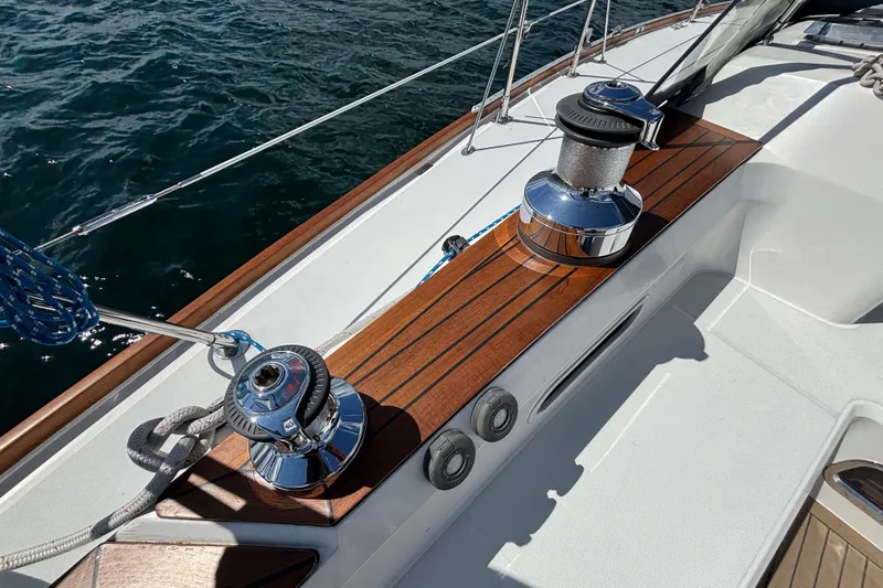 Slide: The Image of Deck of 2002 Sabre 402 sailboat with winches and teak accents. - 21