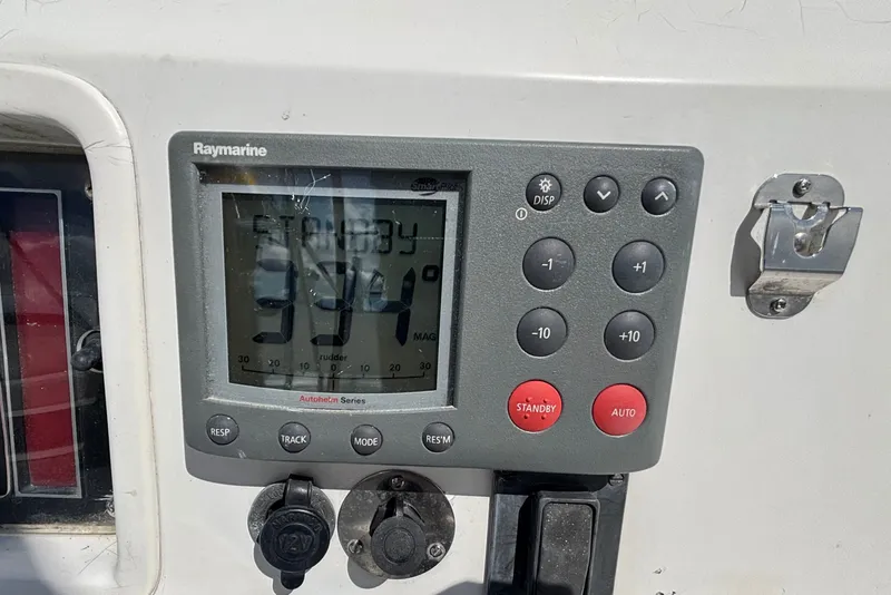 Slide: The Image of Raymarine autopilot display on 2002 Sabre 402 sailboat, showing standby mode at 334 degrees. - 33