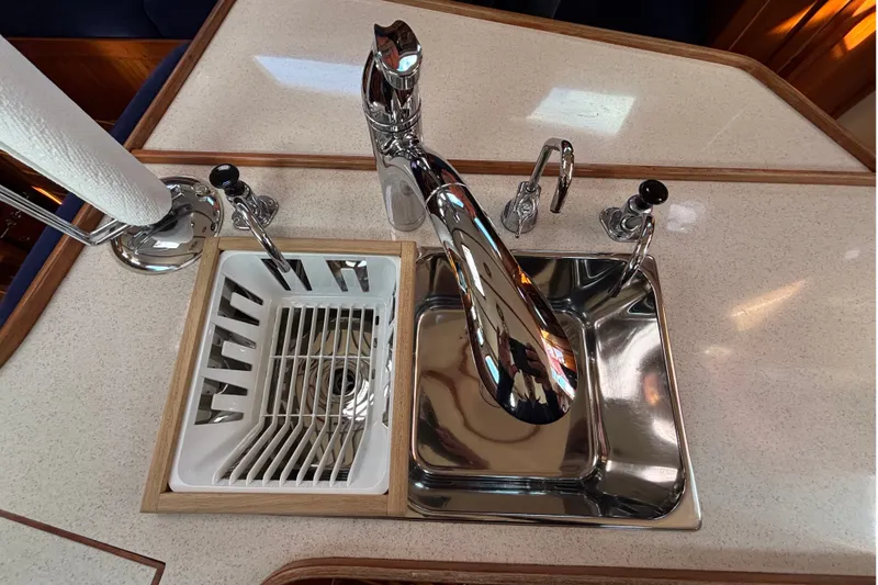 Slide: The Image of Modern kitchen sink setup on a 2002 Sabre 402 yacht. - 67