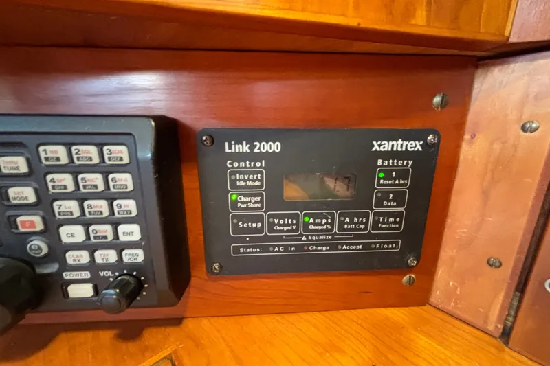 Slide: The Image of Control panel of a 2002 Sabre 402 yacht with Xantrex Link 2000 system. - 44