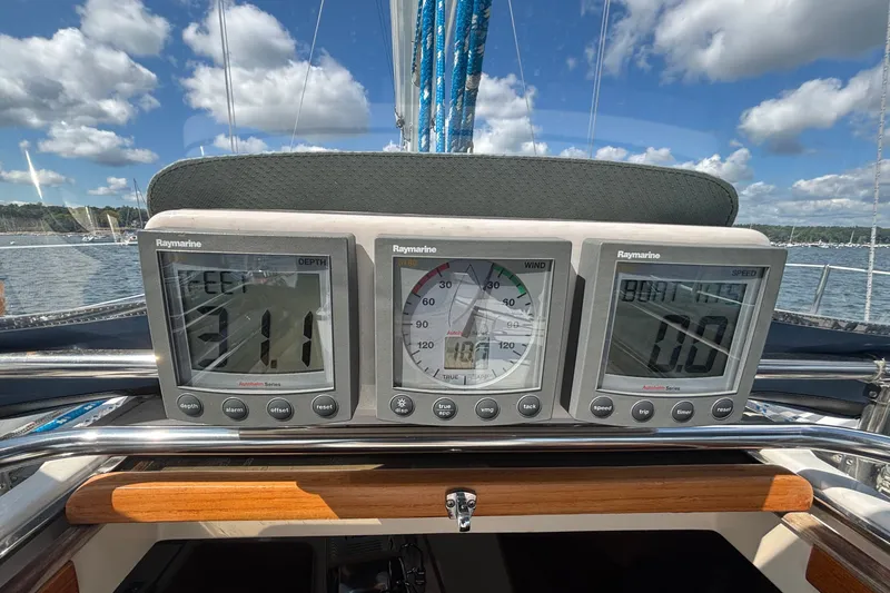 Slide: The Image of Digital navigation instruments on a 2002 Sabre 402 sailboat, displaying depth, wind, and speed. - 34