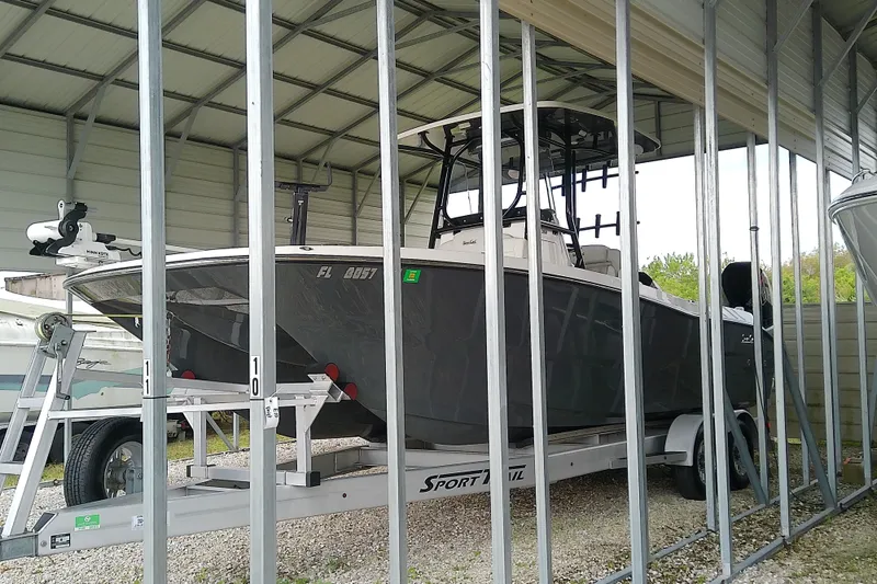 Slide: The Image of 2022 Sea Cat 260 boat on trailer in covered storage facility. - 3
