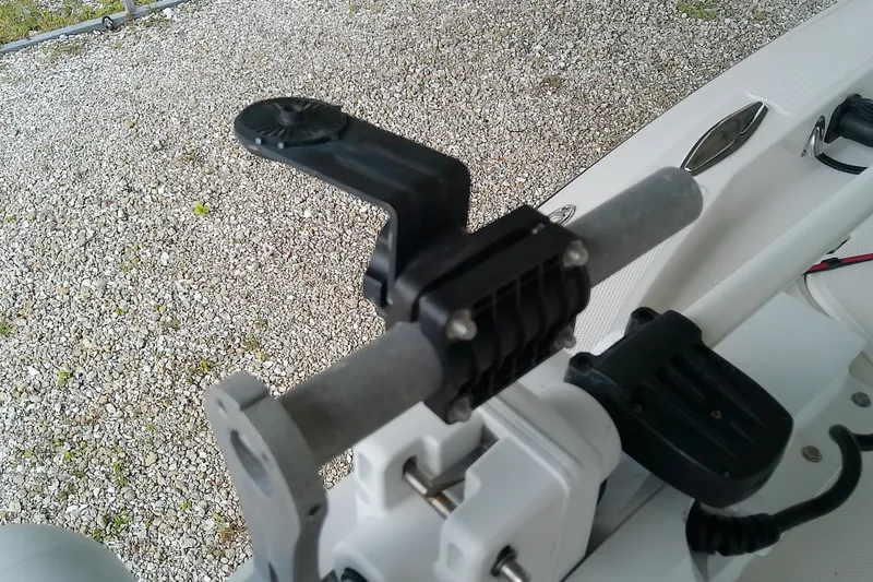 Slide: The Image of Boat accessory mount on a 2022 Sea Cat 260, featuring a sturdy black bracket. - 32