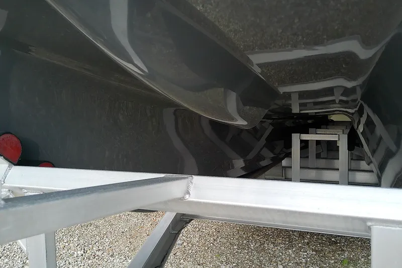 Slide: The Image of Underside view of a 2022 Sea Cat 260 boat on a trailer. - 8