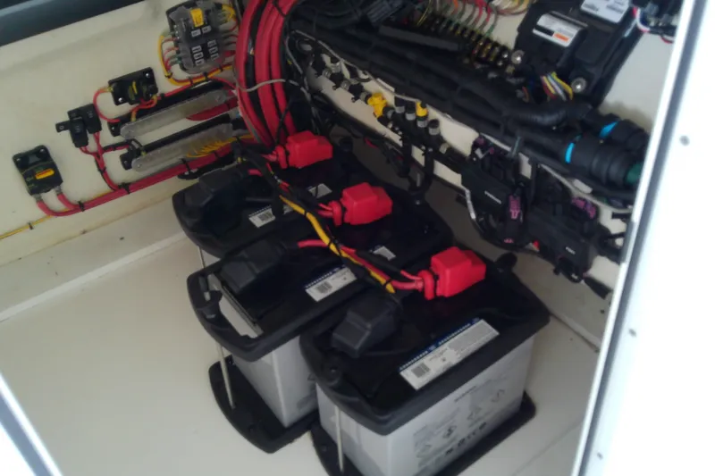 Slide: The Image of Electrical system of a 2022 Sea Cat 260 boat, featuring batteries and wiring. - 57