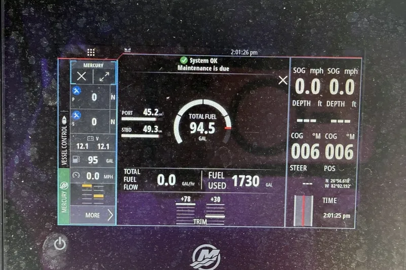 Slide: The Image of Digital display of a 2022 Sea Cat 260 showing fuel and navigation data. - 91