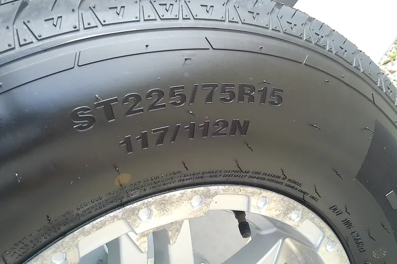 Slide: The Image of Close-up of a Sea Cat 260 tire, model ST225/75R15, year 2022. - 30