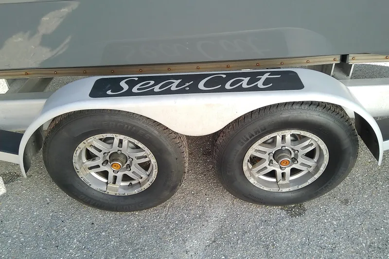 Slide: The Image of Trailer with Sea Cat branding, featuring dual wheels, model 260, year 2022. - 19