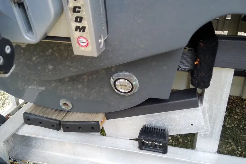 Slide: The Image of Close-up of a 2022 Sea Cat 260 boat hull on a trailer. - 18