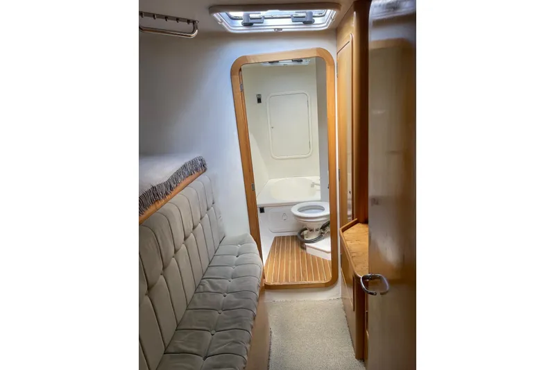 Slide: The Image of The identical forward ensuite queen cabin in the starboard hull. - 21