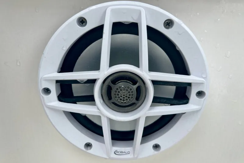 Slide: The Image of White speaker on 2024 Robalo R207 Dual Console boat. - 14