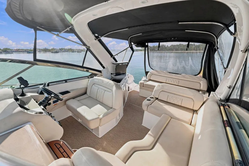 Slide: The Image of Luxurious interior of a 2018 Regal 33 XO boat with spacious seating and scenic water view. - 53