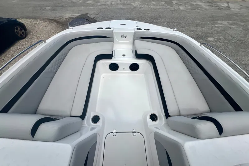 Slide: The Image of 2024 Hurricane Sundeck Sport 218 OB boat interior with spacious seating and modern design. - 17