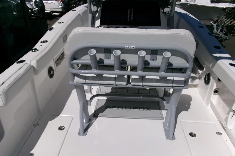 Slide: The Image of 2026 Sea Fox 268 Commander boat interior with rod holders and seating. - 22