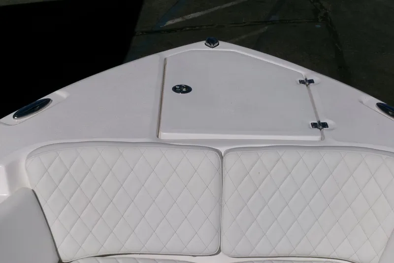 Slide: The Image of Bow seating area of 2026 Sea Fox 268 Commander with white quilted upholstery. - 4