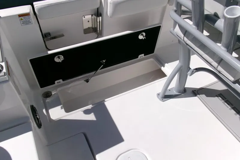 Slide: The Image of 2026 Sea Fox 268 Commander boat interior with storage compartment open. - 40