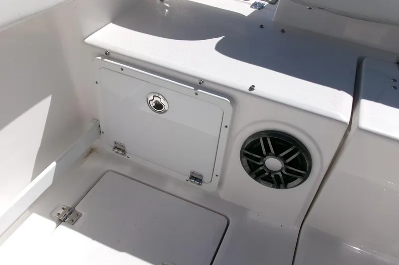 Slide: The Image of 2026 Sea Fox 268 Commander boat interior with storage compartment and speaker. - 33