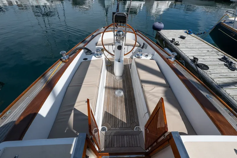 Slide: The Image of Cockpit of 2005 Morris M36 sailboat with wooden accents and steering wheel. - 12