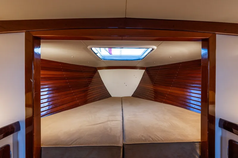 Slide: The Image of Interior cabin of 2005 Morris M36 yacht with wooden paneling and skylight. - 22