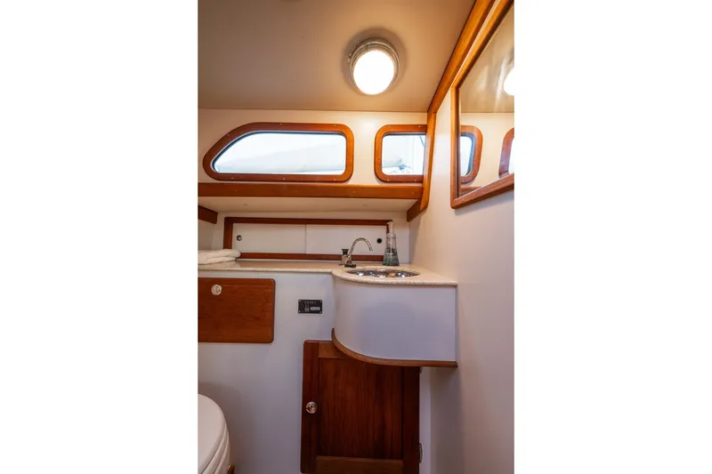 Slide: The Image of Interior of 2005 Morris M36 yacht bathroom with wooden accents and modern fixtures. - 21
