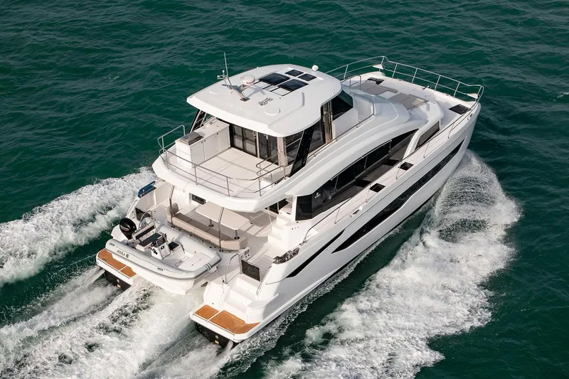 The Image of Manufacturer Provided Image: 2026 Aquila 54 Yacht cruising on open water, aerial view. - 0