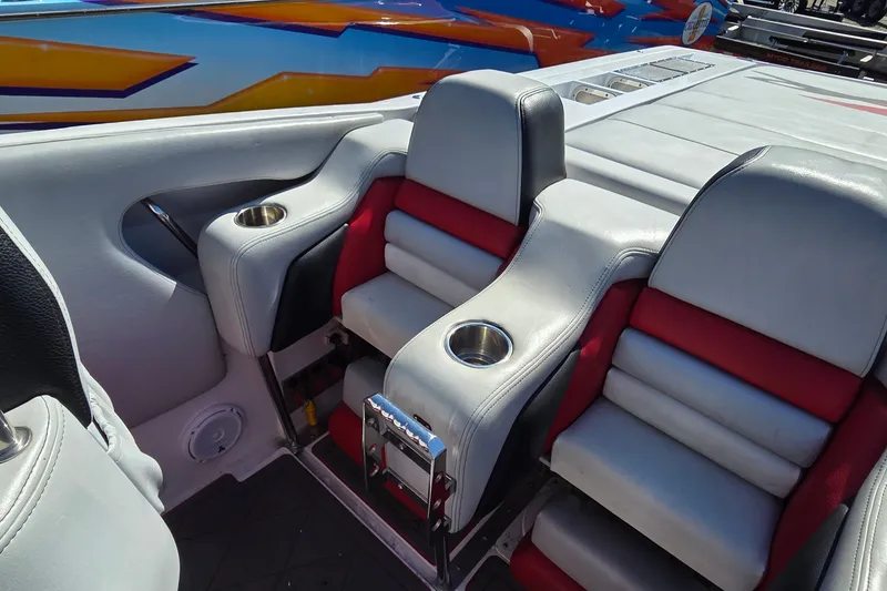 Slide: The Image of Interior of a 2007 Donzi 38 ZR boat with stylish seating and cup holders. - 39