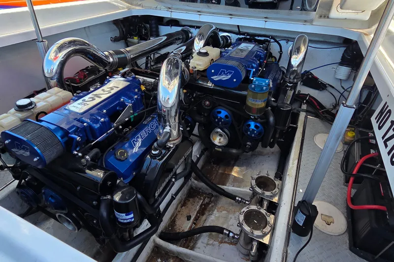 Slide: The Image of Engine compartment of a 2007 Donzi 38 ZR boat with twin Mercury engines. - 23