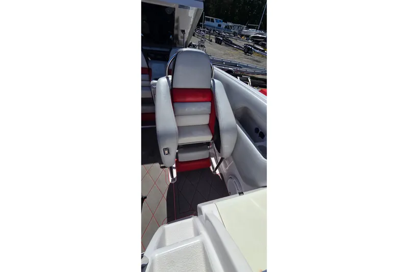 Slide: The Image of 2007 Donzi 38 ZR boat interior with red and white seating. - 35