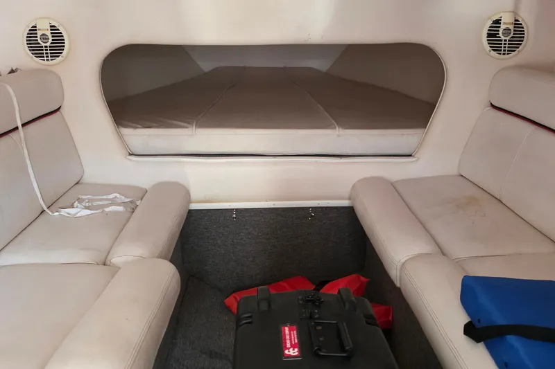 Slide: The Image of Interior cabin of 2007 Donzi 38 ZR boat with seating and sleeping area. - 27