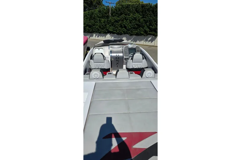 Slide: The Image of 2007 Donzi 38 ZR boat interior with sleek seating and dashboard. - 18