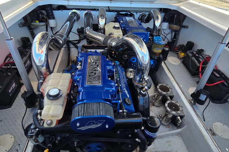 Slide: The Image of Engine compartment of a 2007 Donzi 38 ZR with dual Mercury engines. - 21