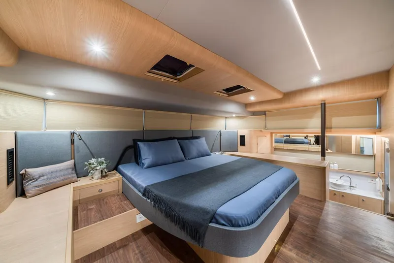 Slide: The Image of Manufacturer Provided Image: Luxurious interior of 2026 Aquila 54 Yacht with modern bedroom design. - 16