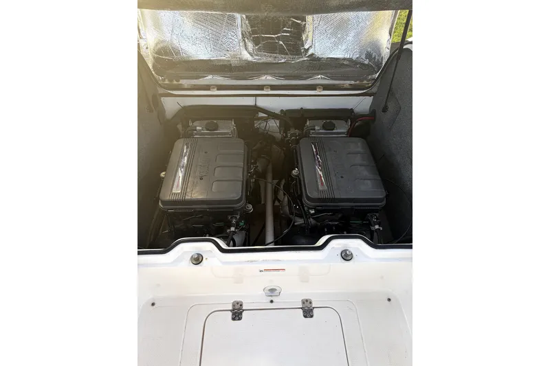 Slide: The Image of 2006 Yamaha Boats AR230 engine compartment with dual engines visible. - 6