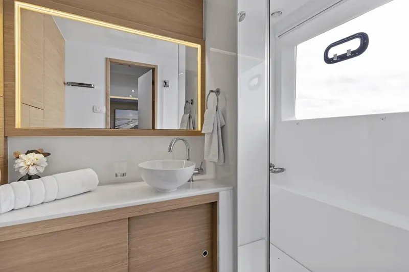 Slide: The Image of Luxurious bathroom interior of 2026 Aquila 50 Yacht with modern fixtures and elegant design. - 53