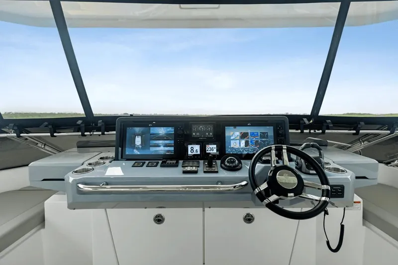 Slide: The Image of Steuerstand der Aquila 50 Yacht 2026 mit modernen Instrumenten. - 20