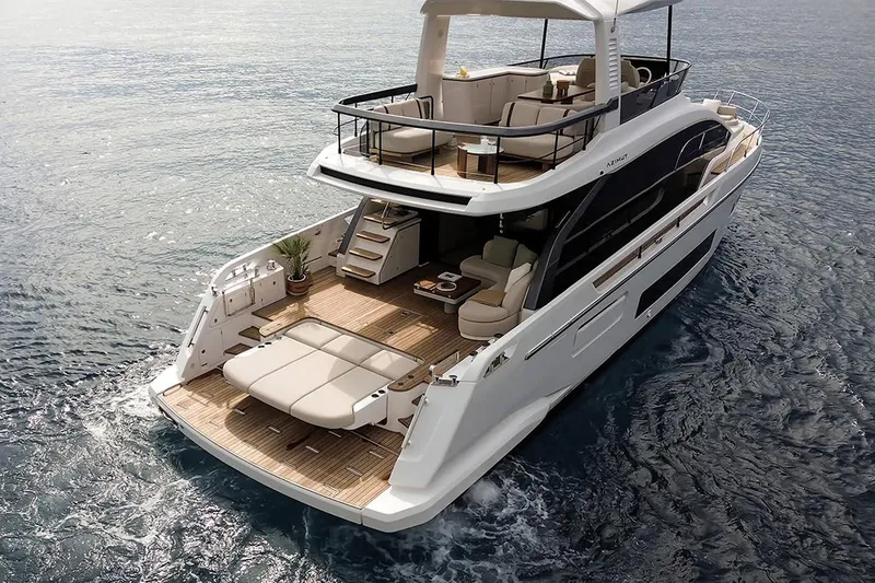 The Image of Manufacturer Provided Image: 2025 Azimut Fly 62 yacht cruising on open water, showcasing luxurious deck and seating. - 0