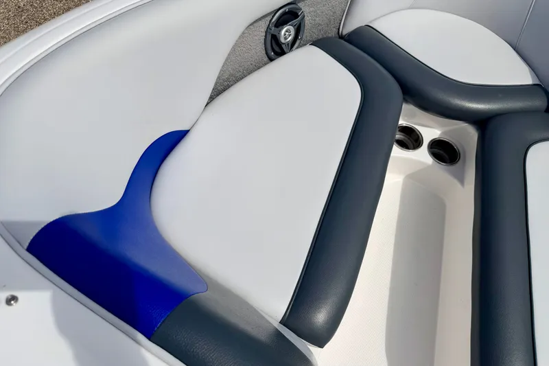 Slide: The Image of 2007 Moomba Outback V boat interior with blue and white cushioned seating. - 65