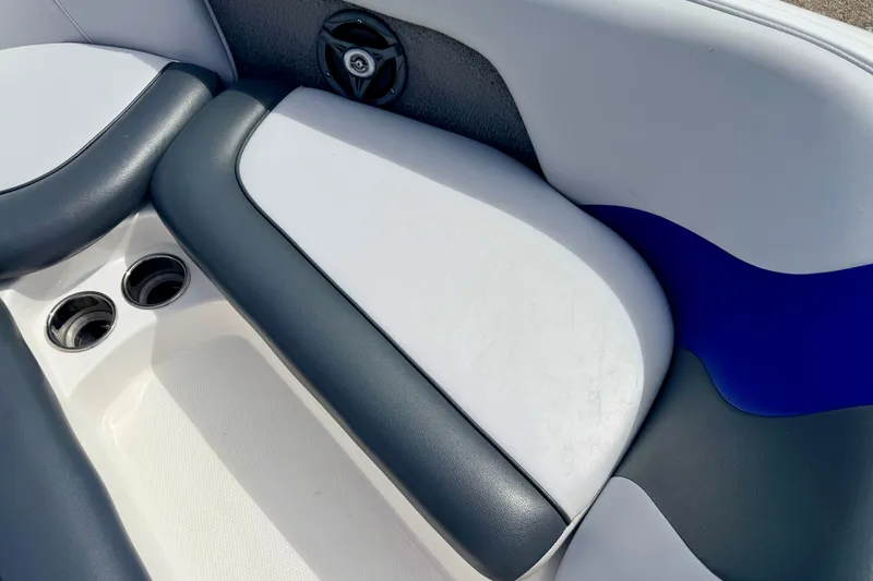 Slide: The Image of 2007 Moomba Outback V boat interior with cushioned seating and cup holders. - 69