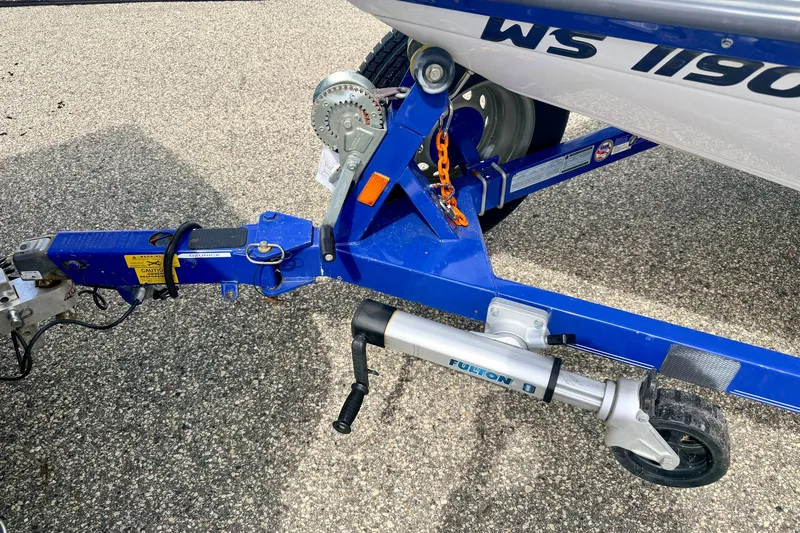 Slide: The Image of Trailer hitch of a 2007 Moomba Outback V boat on pavement. - 81
