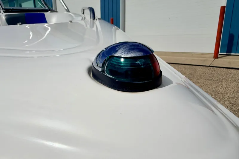 Slide: The Image of Navigation light on 2007 Moomba Outback V boat, close-up view. - 79