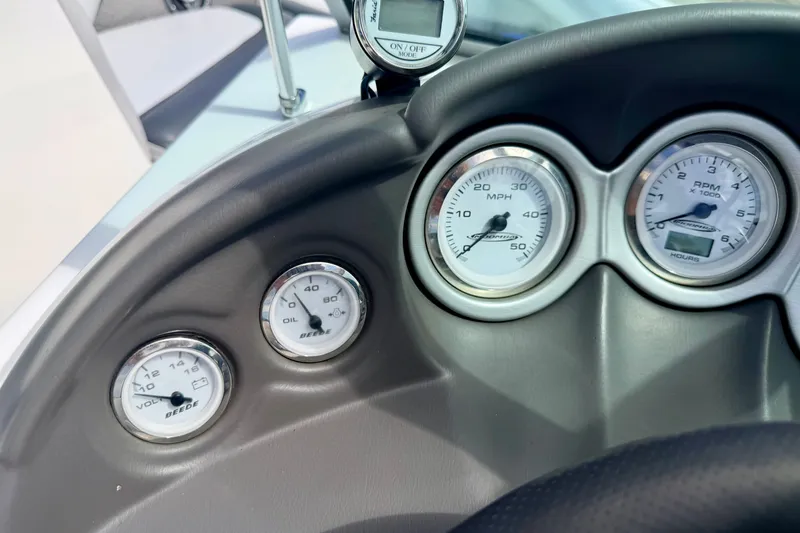 Slide: The Image of Dashboard gauges of a 2007 Moomba Outback V boat, displaying speed, RPM, oil, and voltage. - 51