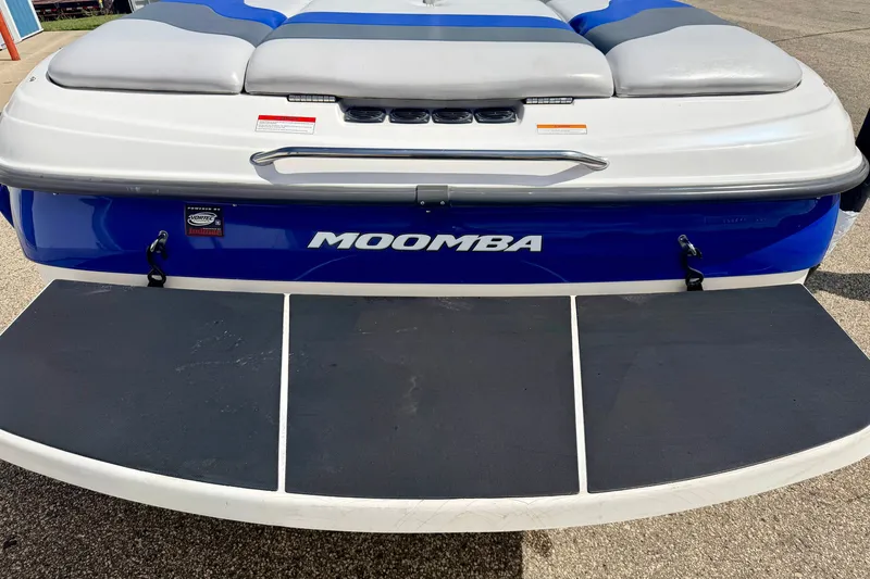 Slide: The Image of 2007 Moomba Outback V boat rear view with swim platform and cushioned seating. - 16