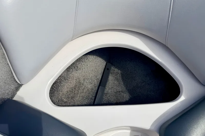 Slide: The Image of 2007 Moomba Outback V boat interior storage compartment with gray upholstery and carpet. - 68
