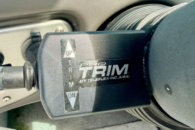 Slide: The Image of Close-up of Pro Trim control by Teleflex in a 2007 Moomba Outback V boat. - 59