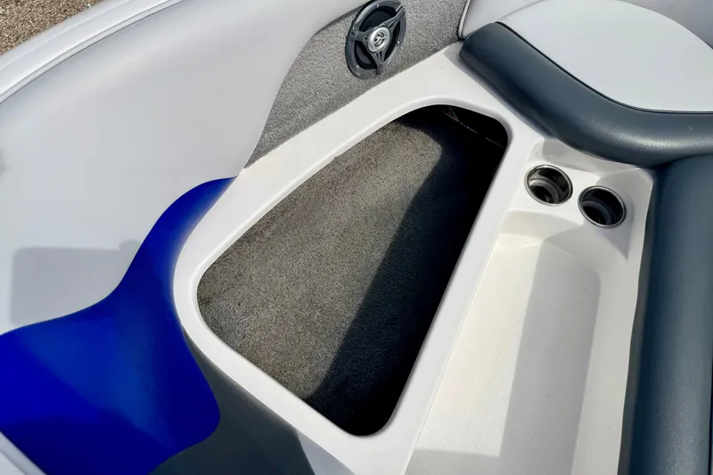 Slide: The Image of 2007 Moomba Outback V boat interior with speaker and cup holders. - 66
