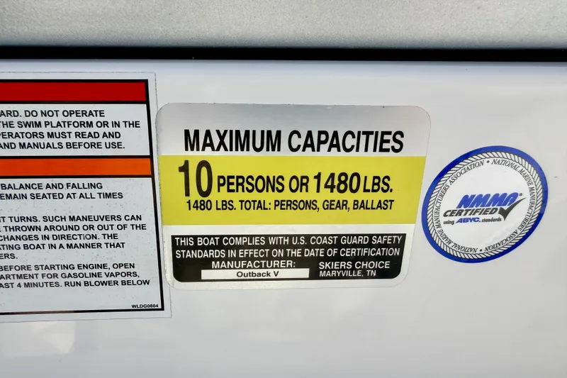 Slide: The Image of 2007 Moomba Outback V capacity label: 10 persons or 1480 lbs, NMMA certified. - 56